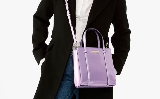 A Woman Wearing Kate Spade Outlet Kenzie Small Tote