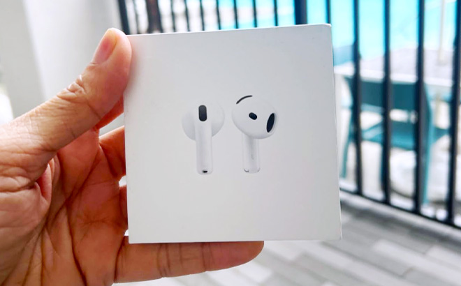 a Person Holding Apple Airpods 4